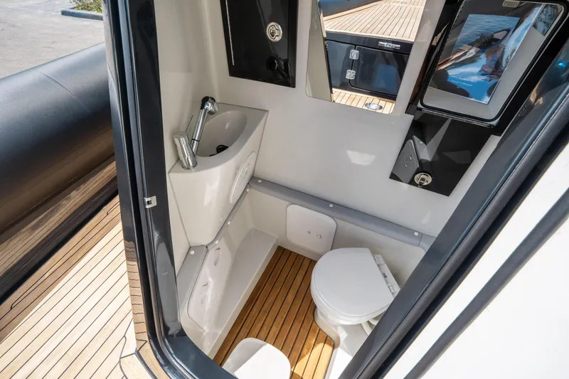 Slide: The Image of Interior of 2023 Ribco Seafarer 36 X boat bathroom with sink and toilet. - 41