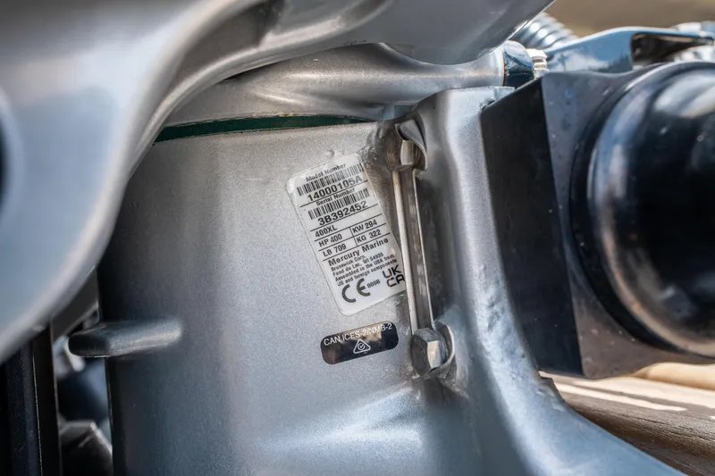 Slide: The Image of Close-up of a 2023 Ribco Seafarer 36 X engine component with labels and markings. - 46