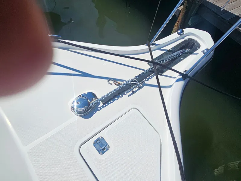 Slide: The Image of Bow of 2000 Tiara Yachts 3100 Open with anchor and mooring lines. - 4