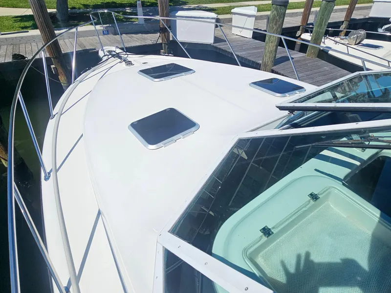 Slide: The Image of 2000 Tiara Yachts 3100 Open boat deck with hatches and railing. - 5