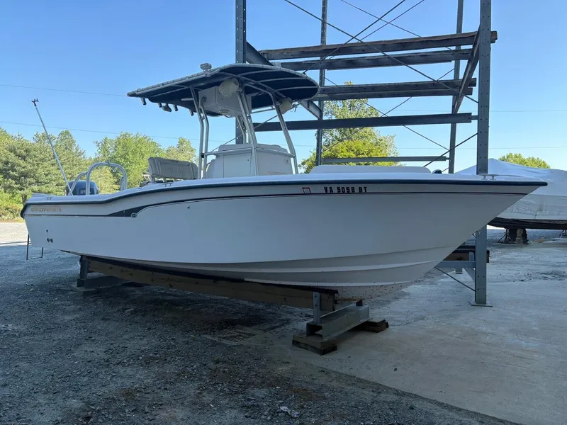 Slide: The Image of 2003 Grady-White Advance 257 boat on dry dock, side view. - 2