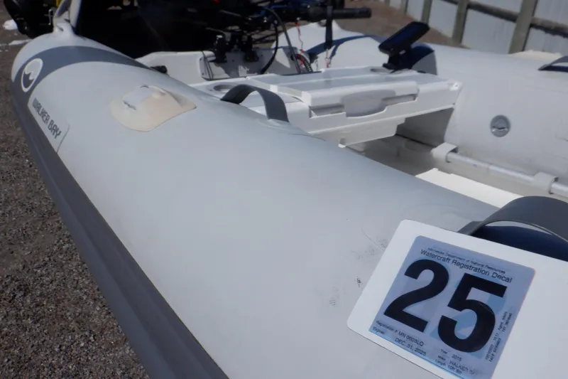 Slide: The Image of Walker Bay Odyssey 325 ST inflatable boat, 2015 model, with registration decal number 25. - 14