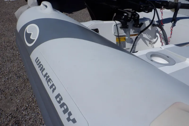 Slide: The Image of Walker Bay Odyssey 325 ST inflatable boat, 2015 model, close-up view. - 15