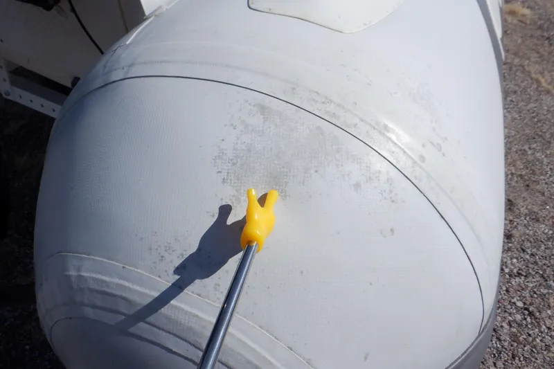 Slide: The Image of 2015 Walker Bay Odyssey 325 ST inflatable boat with a yellow pointer. - 19