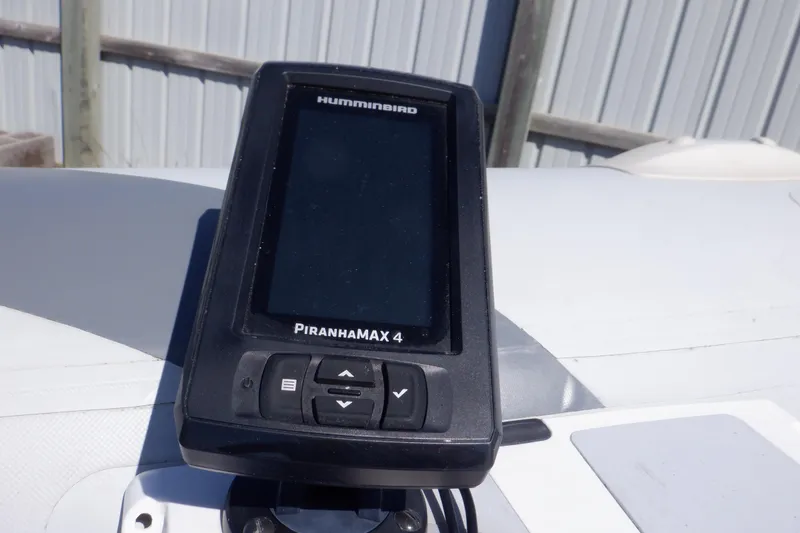 Slide: The Image of Humminbird PiranhaMAX 4 fish finder on Walker Bay Odyssey 325 ST boat. - 28