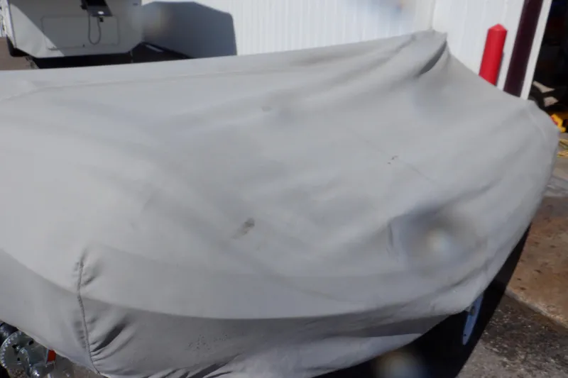 Slide: The Image of Covered 2015 Walker Bay Odyssey 325 ST boat in storage. - 42