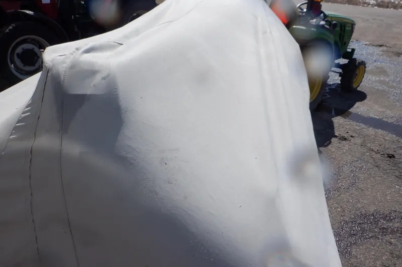 Slide: The Image of Covered 2015 Walker Bay Odyssey 325 ST boat on a wet surface. - 43