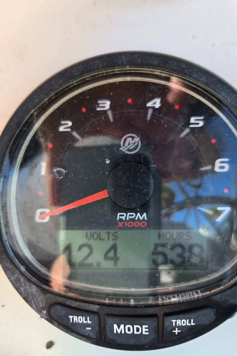 Slide: The Image of Close-up of a 2003 Glacier Bay 2240 SX Renegade tachometer showing 538 hours and 12.4 volts. - 12