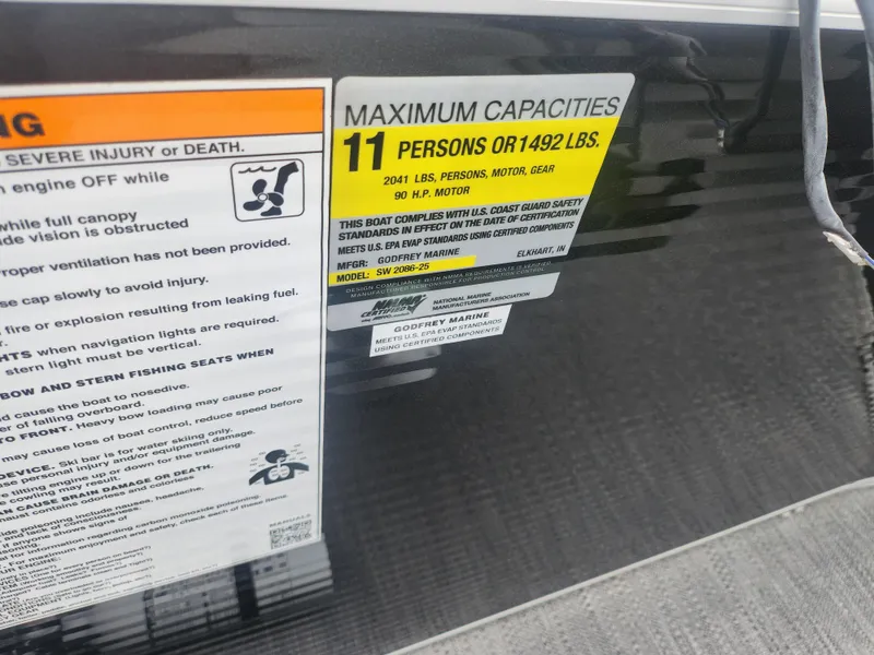 Slide: The Image of Capacity label on 2021 Godfrey Sweetwater 2086 C, max 11 persons or 1492 lbs. - 13