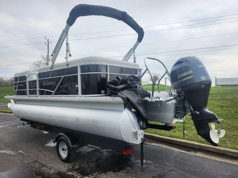 Slide: The Image of 2021 Godfrey Sweetwater 2086 C pontoon boat with Yamaha outboard motor on trailer. - 3