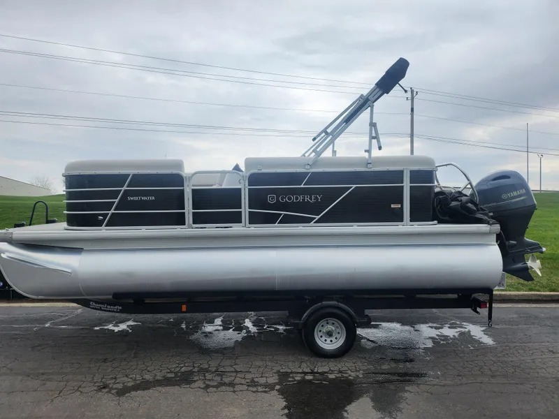 Slide: The Image of 2021 Godfrey Sweetwater 2086 C pontoon boat on trailer, side view. - 4