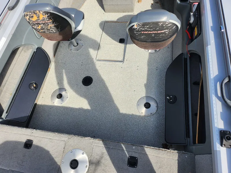 Slide: The Image of 2007 Tracker Targa 175 SC boat interior with seating and storage compartments. - 12