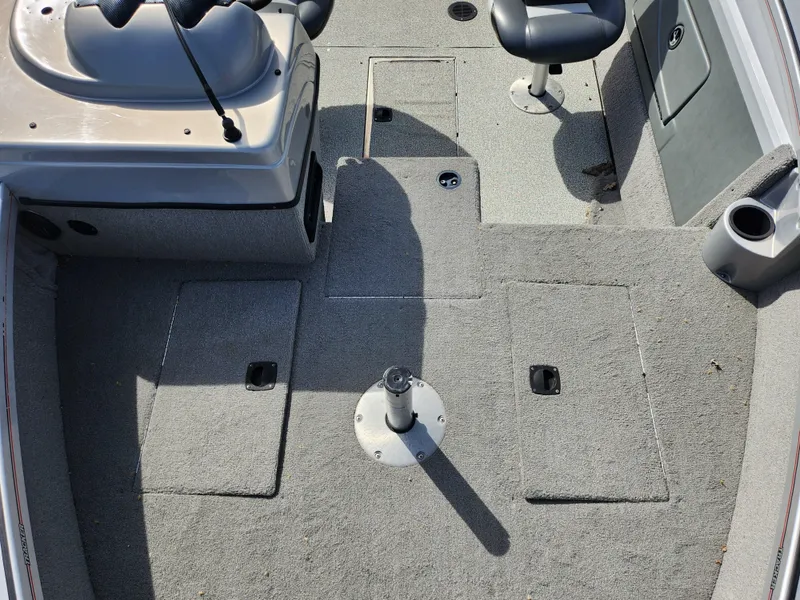 Slide: The Image of 2007 Tracker Targa 175 SC boat interior with gray carpet and seating. - 21