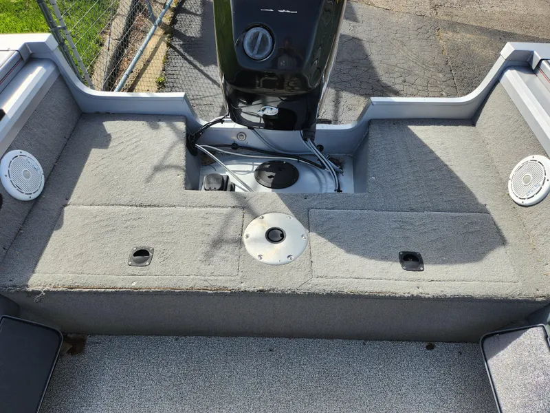 Slide: The Image of 2007 Tracker Targa 175 SC boat interior with motor and seating area. - 23