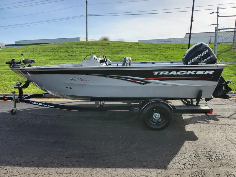 Slide: The Image of 2007 Tracker Targa 175 SC boat with Mercury engine on trailer, parked outdoors. - 4