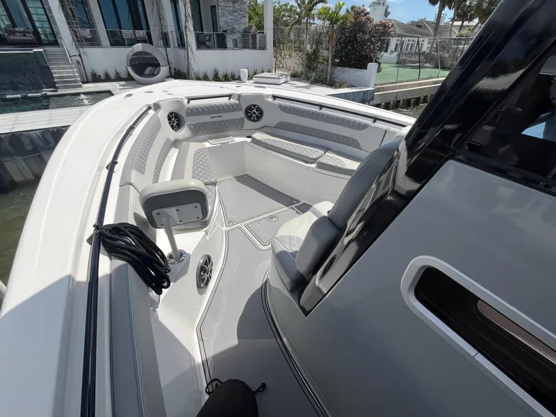 Slide: The Image of 2022 Seapro 320 DLX boat interior with seating and modern design. - 12