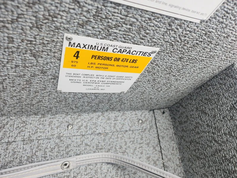Slide: The Image of U.S. Coast Guard capacity label on 2016 G3 Eagle 166 boat, indicating 4 persons or 474 lbs. - 13