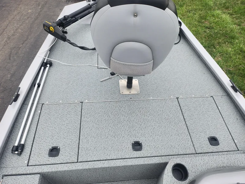 Slide: The Image of 2016 G3 Eagle 166 boat deck with seat and storage compartments. - 14