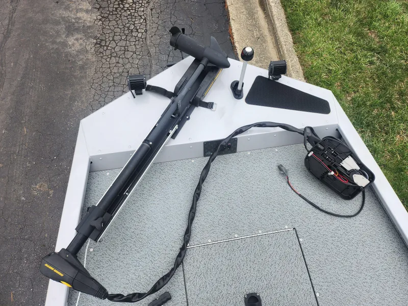 Slide: The Image of 2016 G3 Eagle 166 boat deck with trolling motor and battery setup. - 17