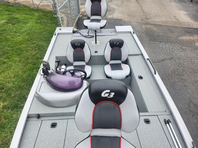 Slide: The Image of 2016 G3 Eagle 166 boat interior with seating and steering console. - 19