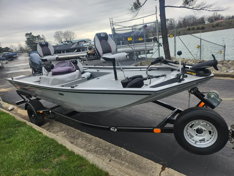 Slide: The Image of 2016 G3 Eagle 166 boat on trailer near a lake, ready for fishing. - 9