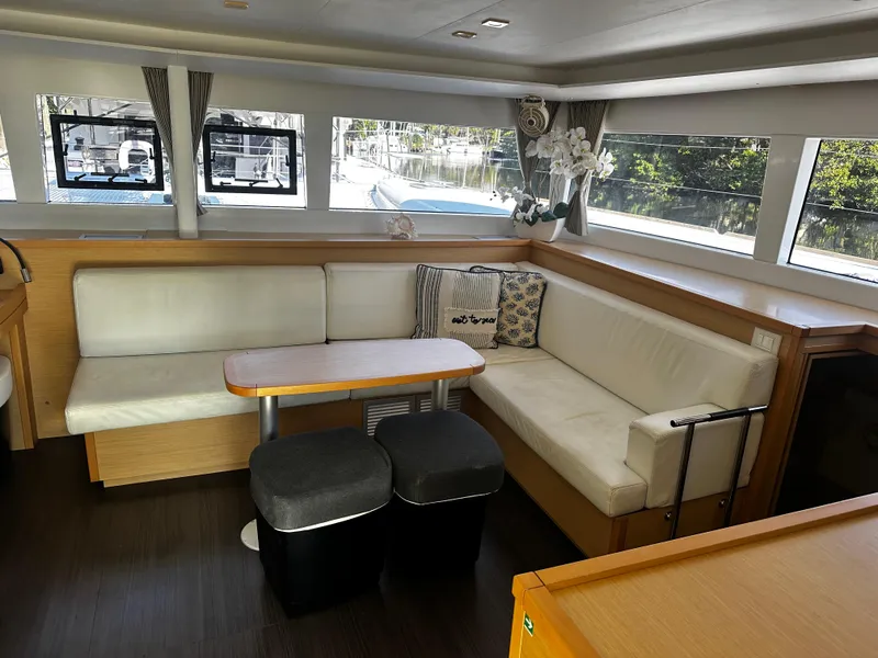 Slide: The Image of Spacious interior of 2017 Lagoon 450 F catamaran with comfortable seating and modern decor. - 23
