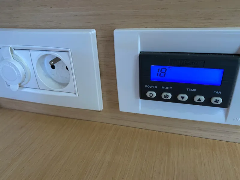 Slide: The Image of Power outlet and digital control panel on Lagoon 450 F, 2017 model yacht. - 34