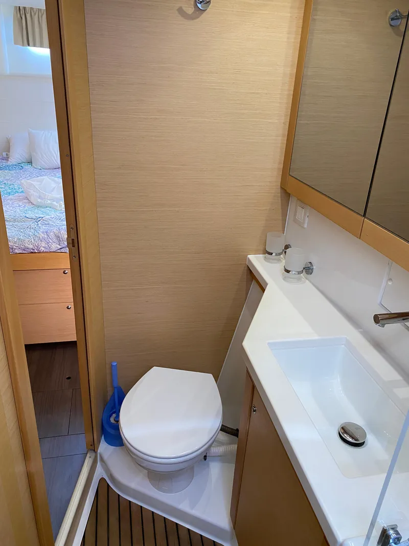 Slide: The Image of Bathroom interior of 2017 Lagoon 450 F yacht, featuring modern fixtures and compact design. - 42