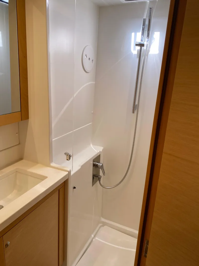 Slide: The Image of Modern bathroom in 2017 Lagoon 450 F yacht with sleek shower and sink. - 43