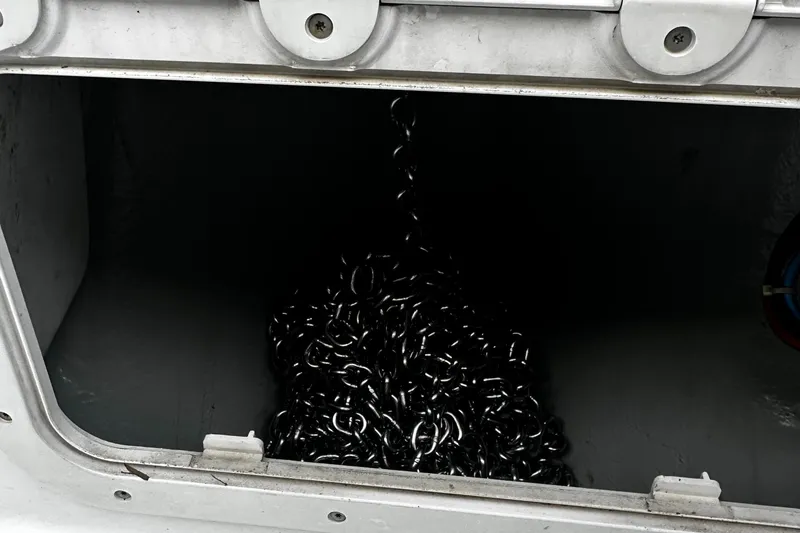 Slide: The Image of Anchor chain storage compartment on a 2017 Lagoon 450 F catamaran. - 45