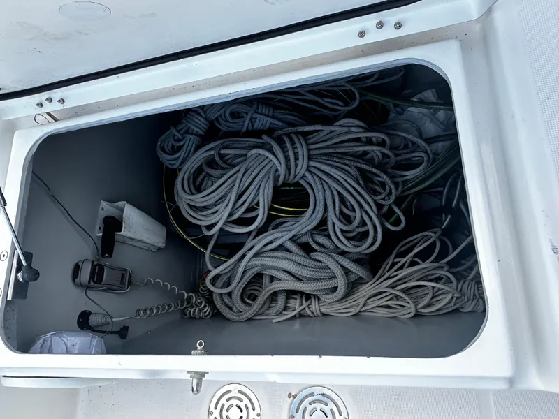 Slide: The Image of Storage compartment with coiled ropes on a 2017 Lagoon 450 F yacht. - 69