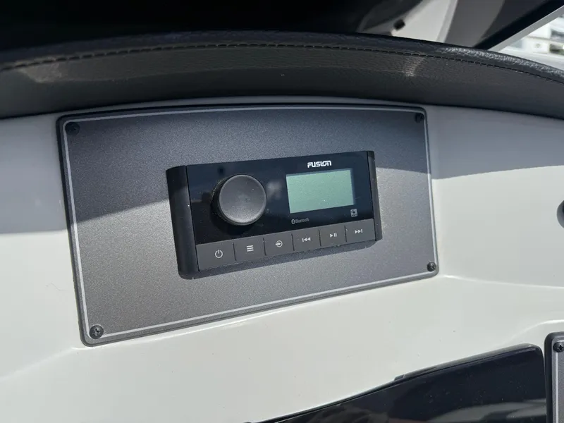 Slide: The Image of Fusion audio system on 2021 Hurricane SunDeck 217 OB boat dashboard. - 23