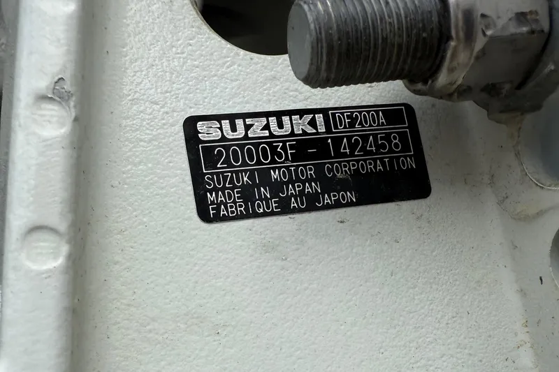 Slide: The Image of Suzuki DF200A engine label on 2021 Hurricane SunDeck 217 OB, made in Japan. - 31