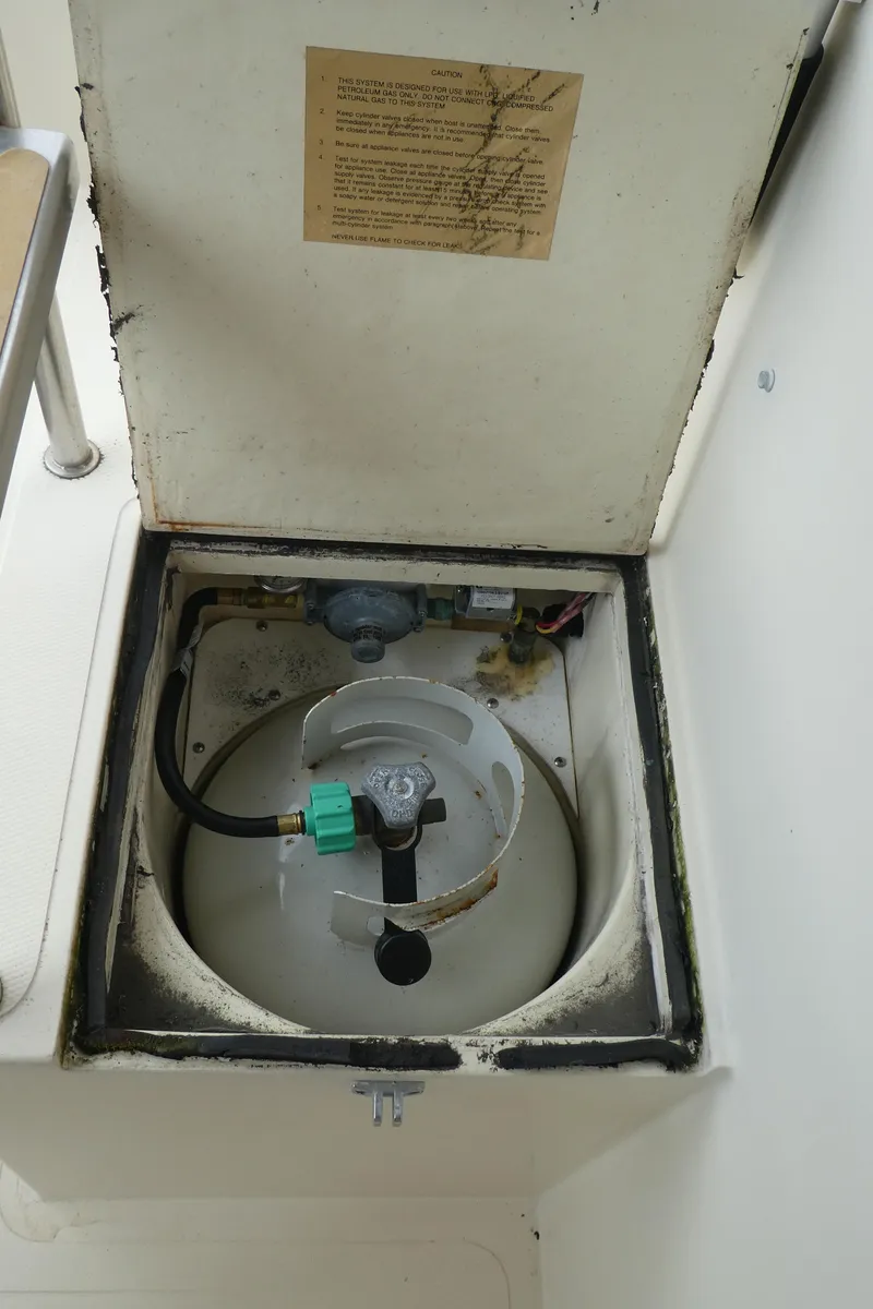 Slide: The Image of Propane tank compartment on a 1992 Camano 31 boat. - 38
