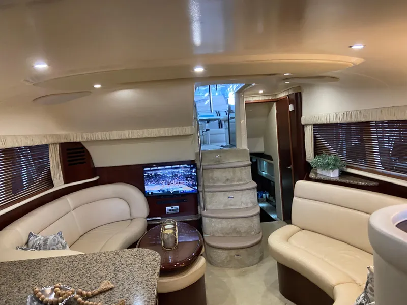 Slide: The Image of Luxurious interior of 2006 Sea Ray 40MY yacht with plush seating and modern amenities. - 22