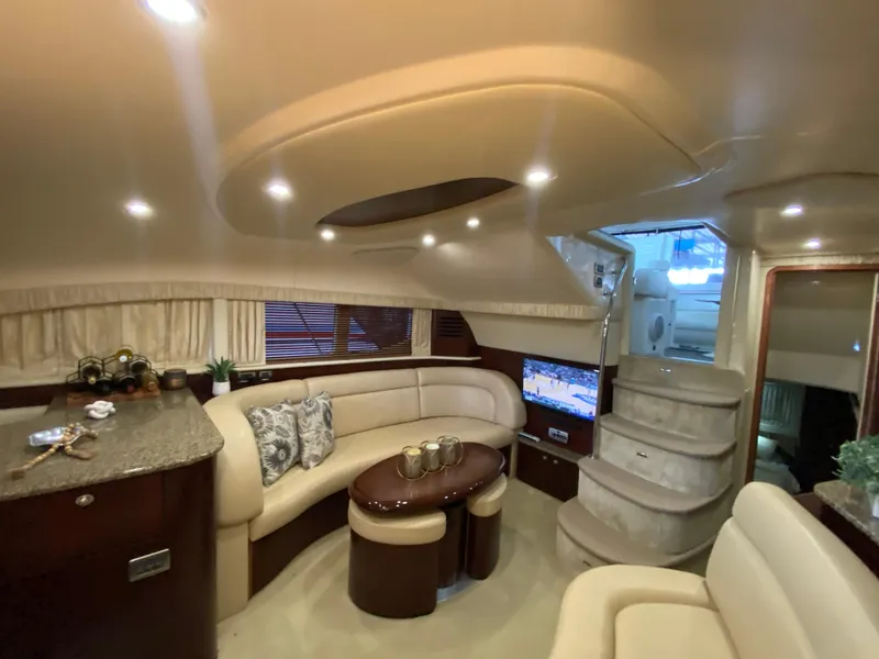 Slide: The Image of Luxurious interior of 2006 Sea Ray 40MY yacht with elegant seating and modern amenities. - 23