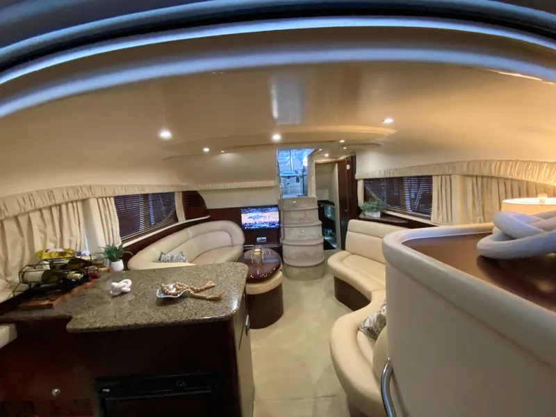 Slide: The Image of Luxurious interior of a 2006 Sea Ray 40MY yacht with elegant seating and modern amenities. - 24