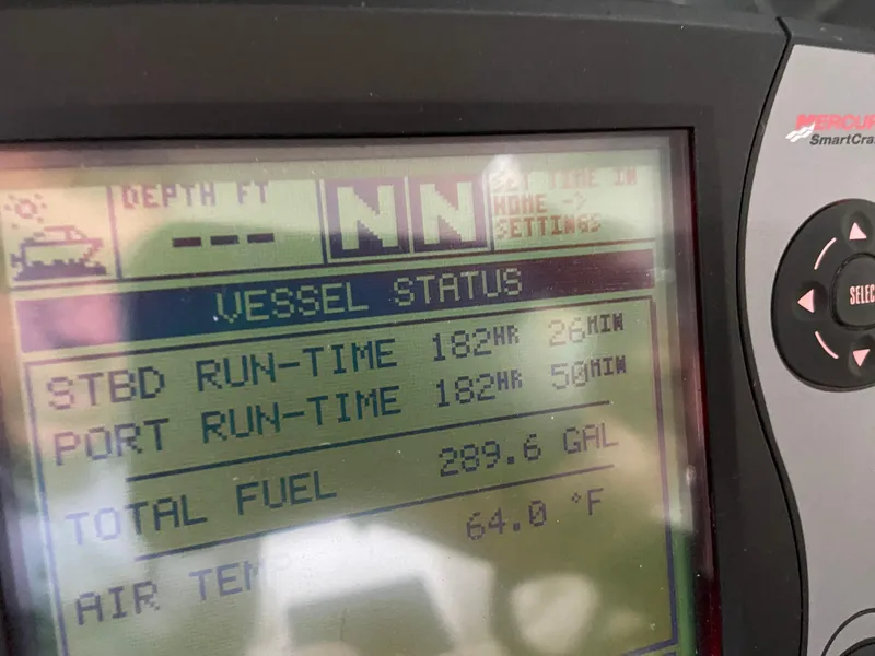 Slide: The Image of Close-up of a 2006 Sea Ray 40MY vessel status display showing runtime and fuel data. - 43