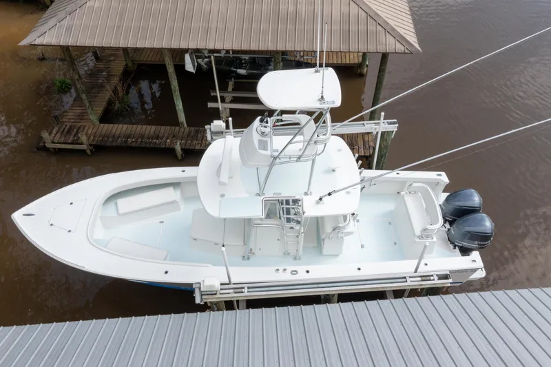 Slide: The Image of Aerial view of 2018 Albury Brothers 33 boat docked with dual engines. - 11