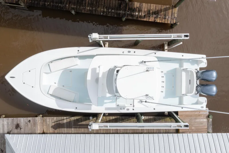 Slide: The Image of Overhead view of 2018 Albury Brothers 33 boat docked with twin engines. - 12