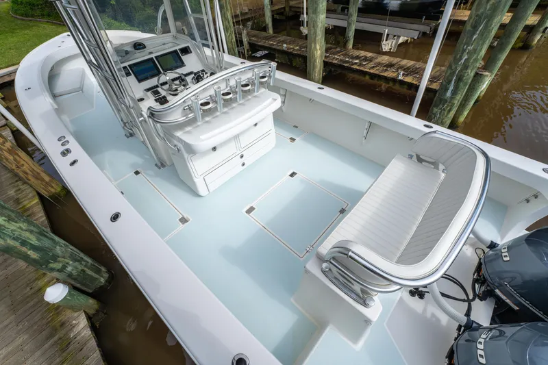 Slide: The Image of 2018 Albury Brothers 33 boat with spacious deck and modern controls. - 18