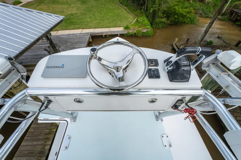 Slide: The Image of Helm of 2018 Albury Brothers 33 boat with Garmin navigation system. - 36