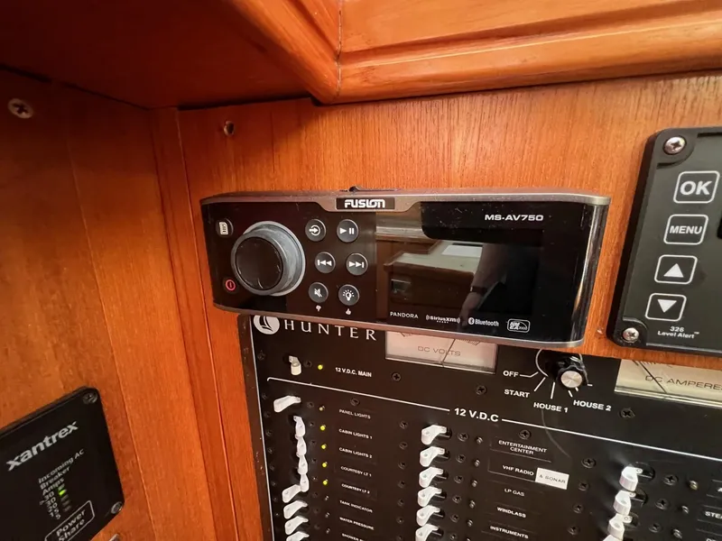 Slide: The Image of Fusion MS-AV750 stereo system on 2002 Hunter 386 sailboat control panel. - 30