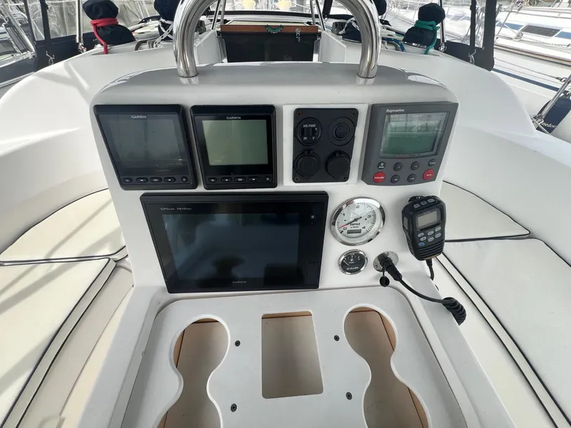 Slide: The Image of Control panel of a 2002 Hunter 386 sailboat with navigation instruments. - 9