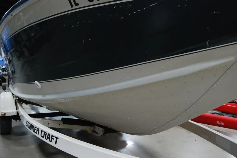 Slide: The Image of 1998 Smoker Craft 178 Fazer boat on trailer, close-up view of hull. - 18