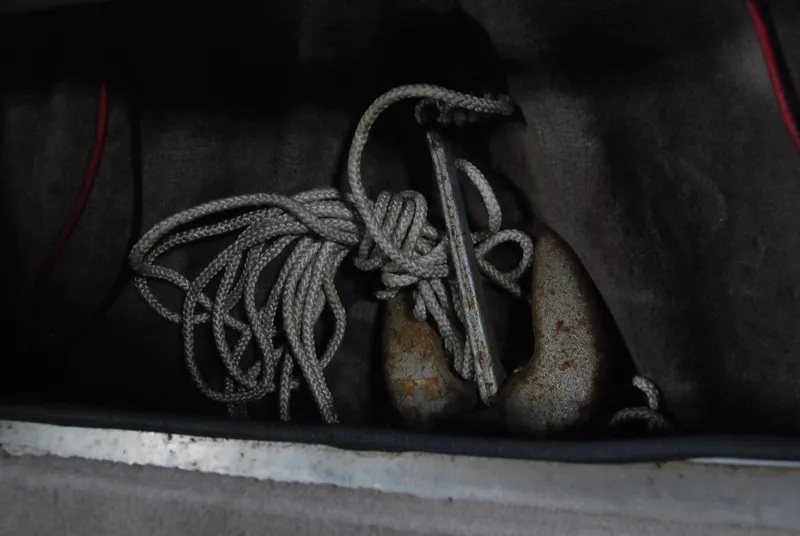 Slide: The Image of Anchor and rope in a 1998 Smoker Craft 178 Fazer boat compartment. - 30
