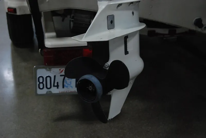 Slide: The Image of 1998 Smoker Craft 178 Fazer boat propeller and license plate detail. - 34