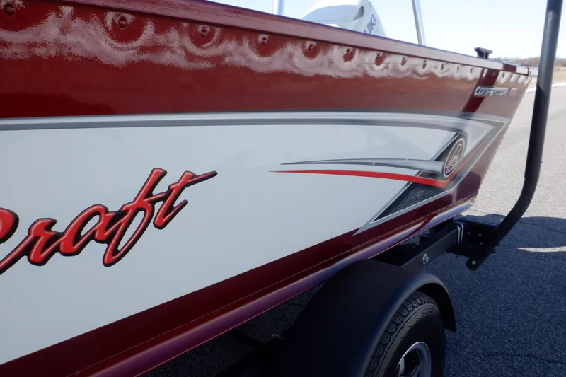 Slide: The Image of 2020 Alumacraft Competitor 165 Sport boat, red and white exterior, close-up view. - 36