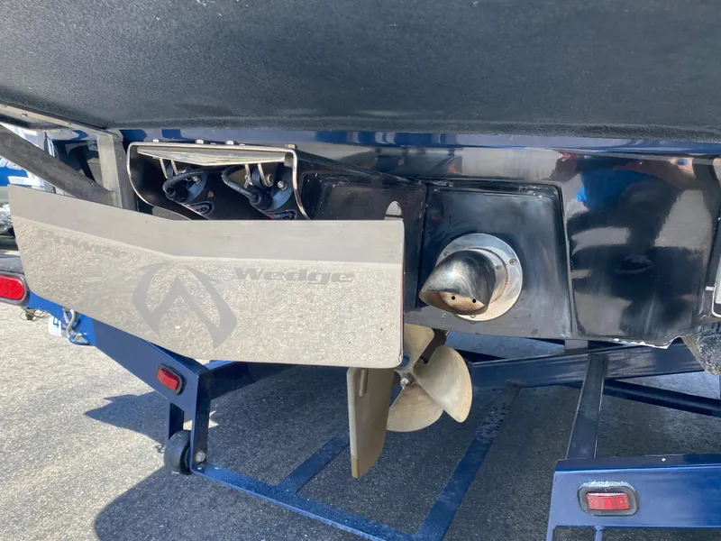 Slide: The Image of 2007 Malibu Wakesetter VLX boat propeller and rudder detail on trailer. - 8