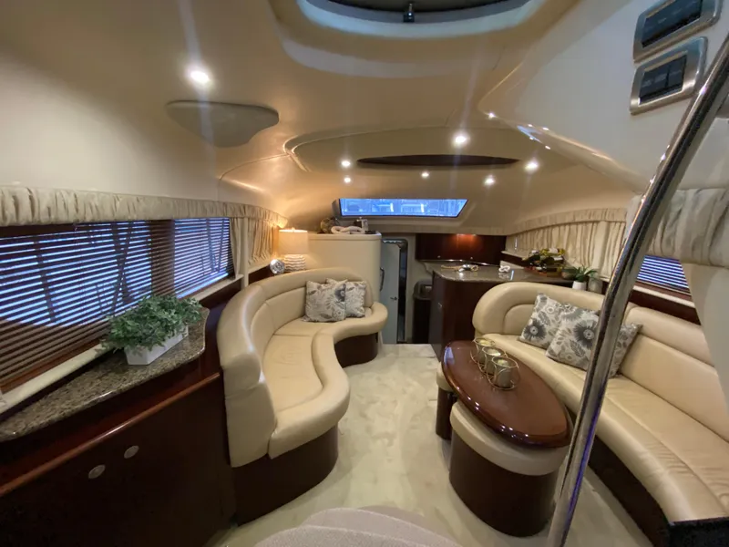Slide: The Image of Luxurious interior of 2006 Sea Ray 40 Motor Yacht with elegant seating and decor. - 12